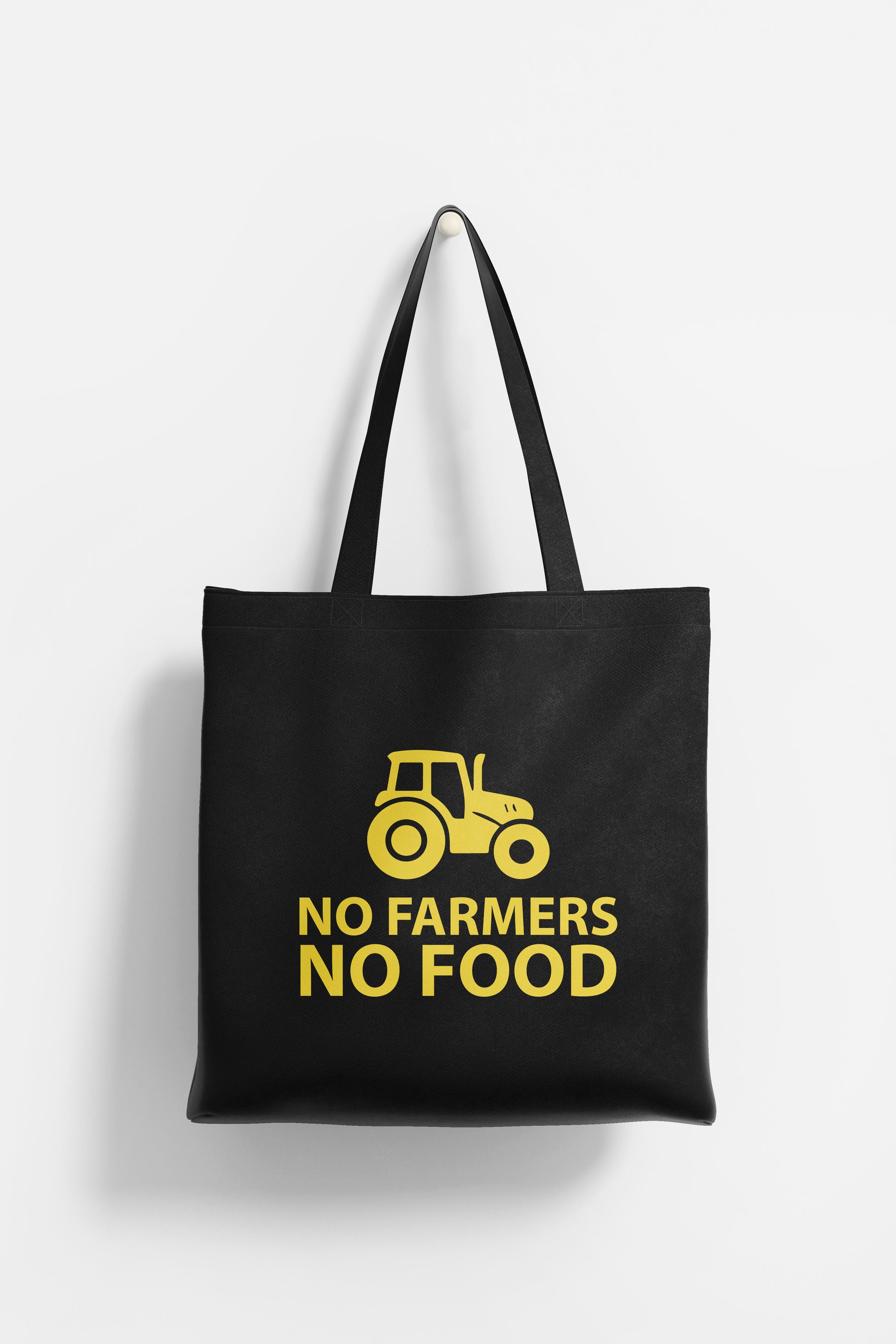 No Farmers No Food yellow logo on black tote bag